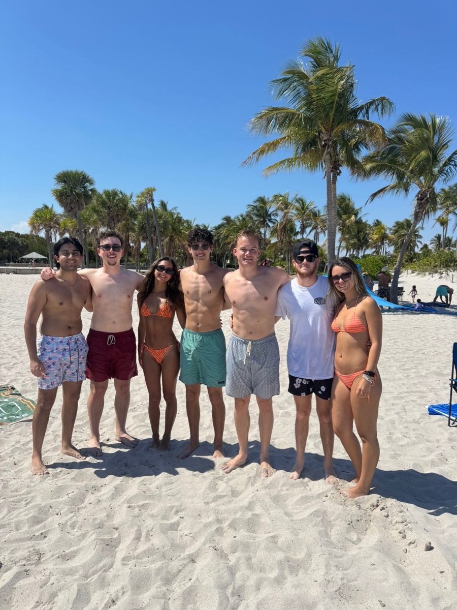 Nicholas with friends at the beach in Miami